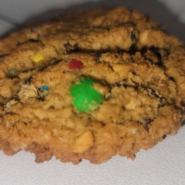 A cookie with m & m's on it.