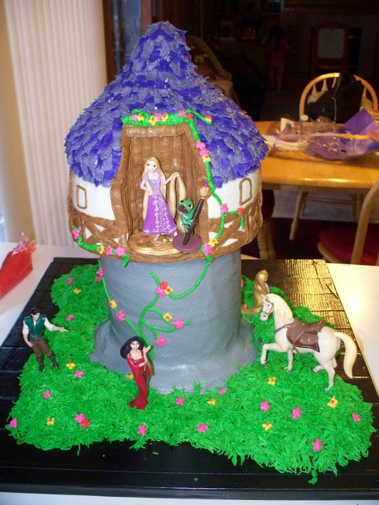 Custom cake with a castle on top of it. Made by Nan's Nummies