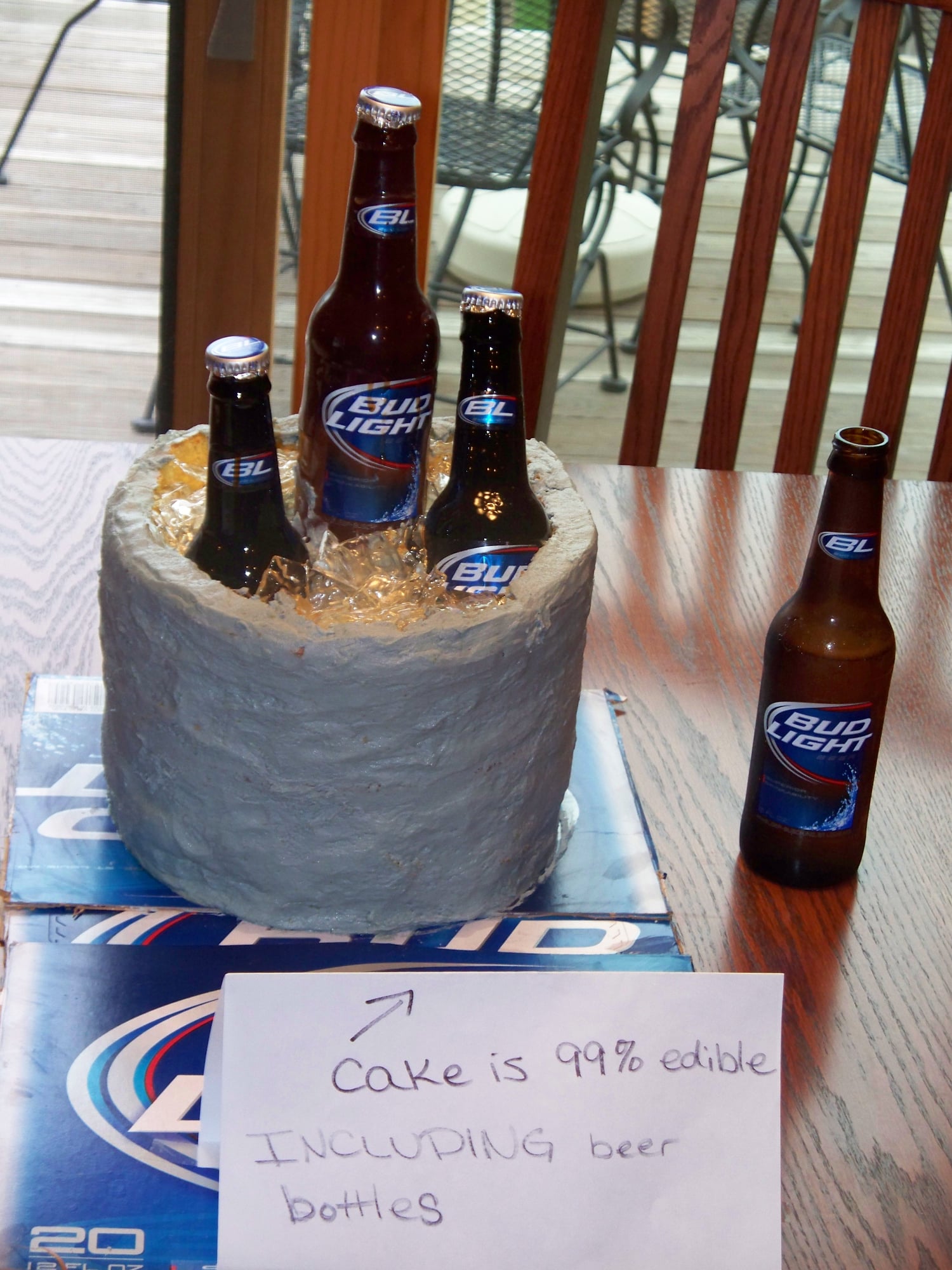 Custom cake with six beer bottles on it. Made by Nan's Nummies