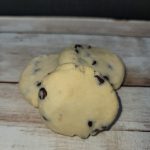 Chocolate chip cookies on a wooden table.