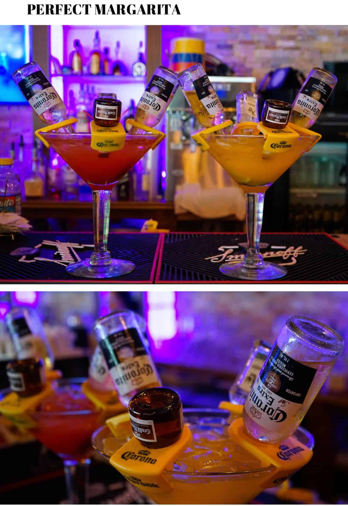 Margaritas are shown on a bar top.