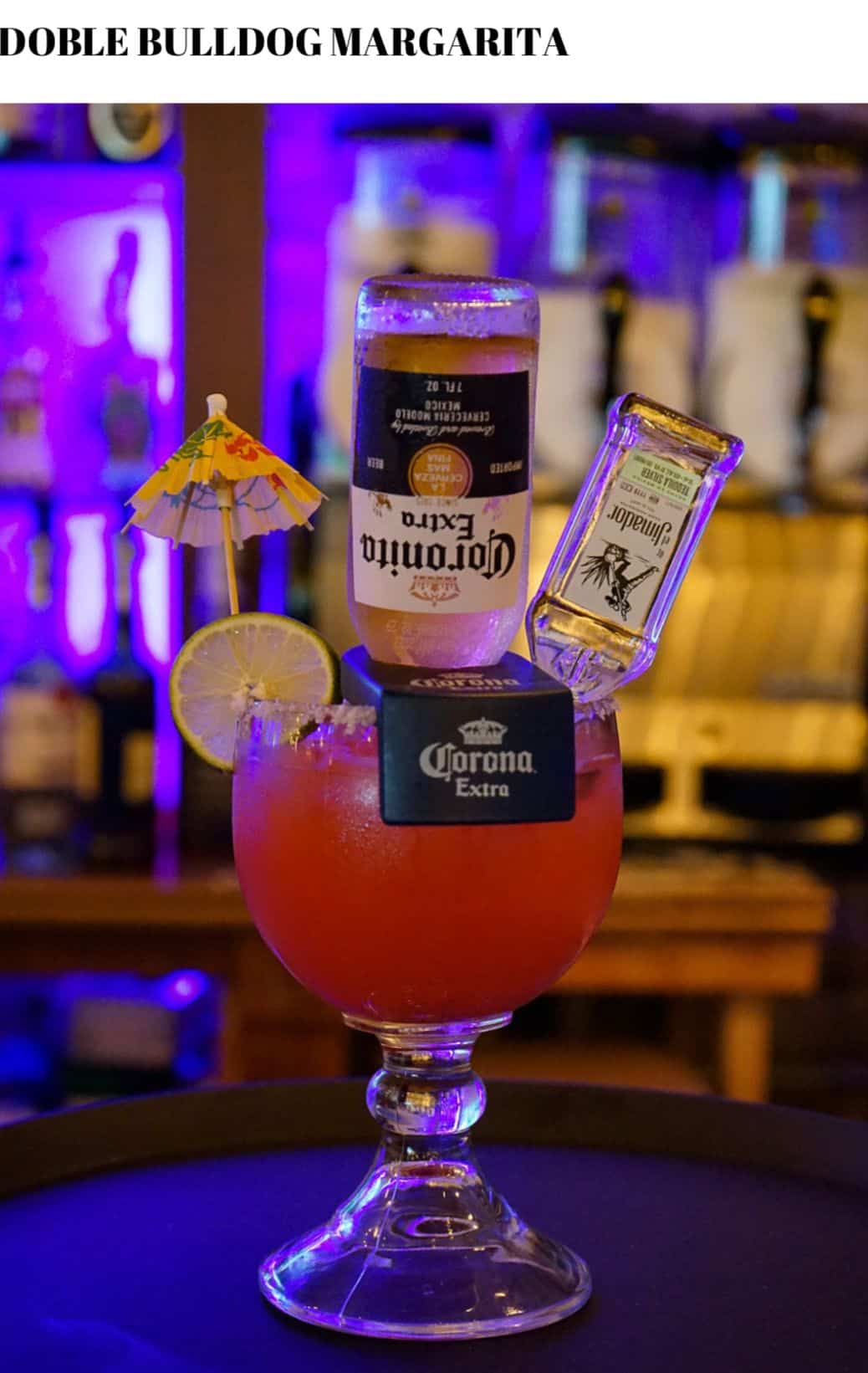 A margarita is sitting on a table.