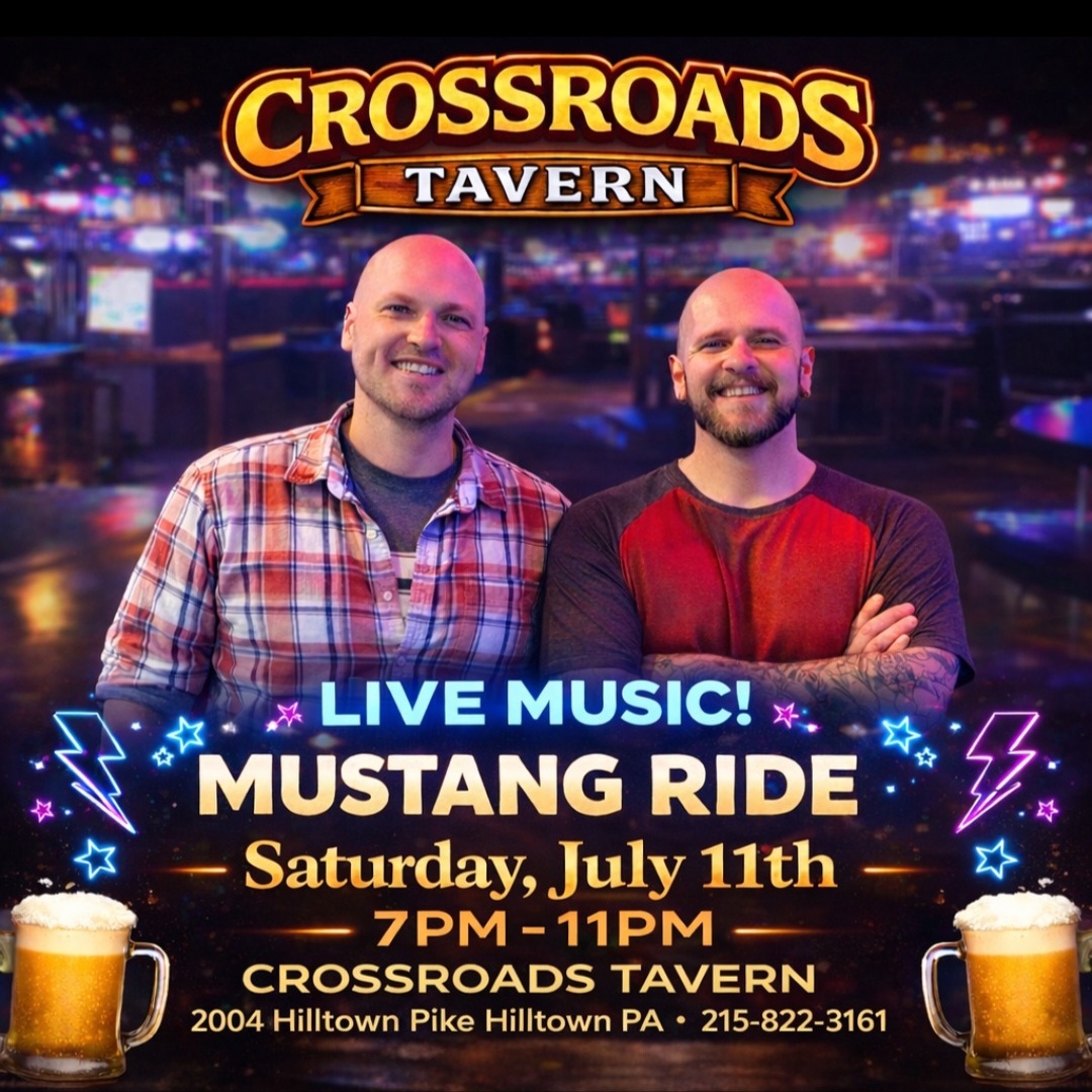 Two men stand and smile in front of a bar background; event details below promote live music by Mustang Ride at Crossroads Tavern on Saturday, July 11th, 7-11PM.