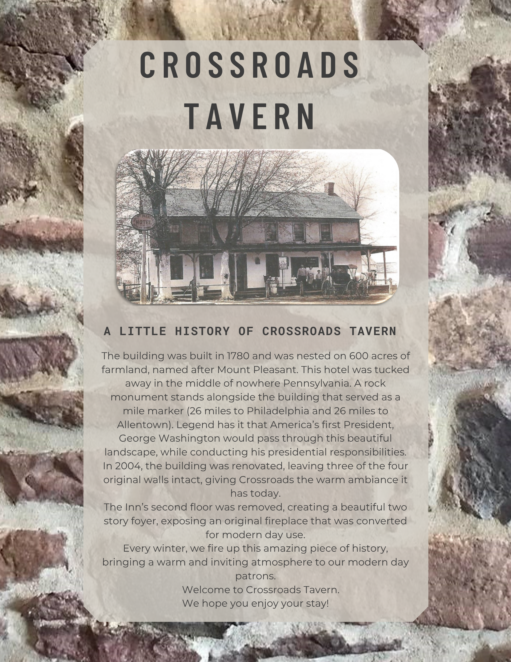 Historic Crossroads Tavern stands in front of a brick wall, with text describing its 1780 origins, renovation, and role as a welcoming inn for travelers past and present.